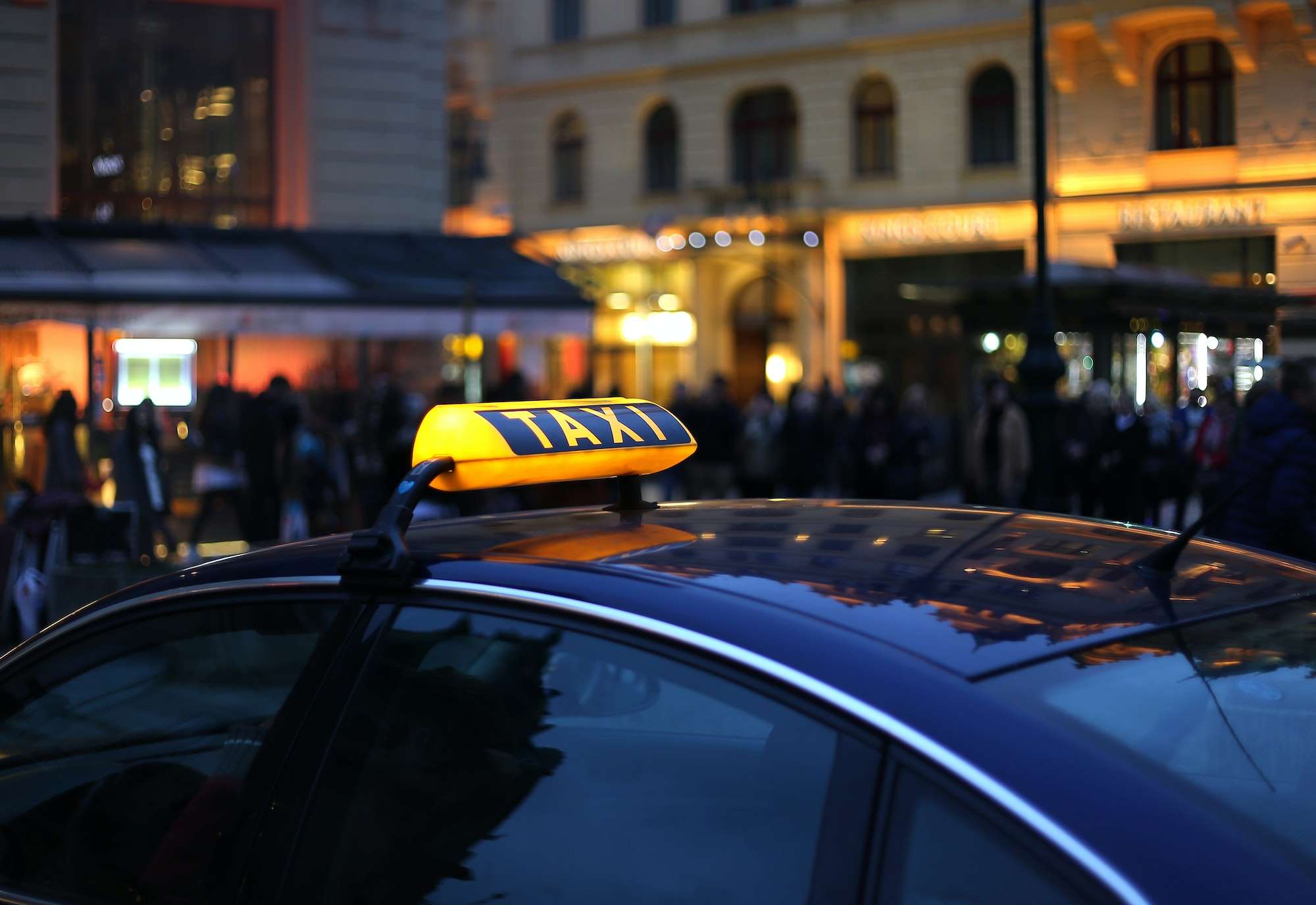 Taxi sign at night